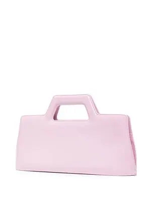 Back view of Ferragamo Wanda pink leather handbag on white background