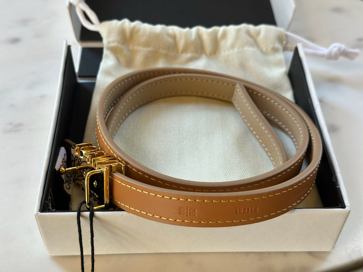 Loewe Graphic Buckle Leather Skinny Belt in Oak Gold Side View in Box