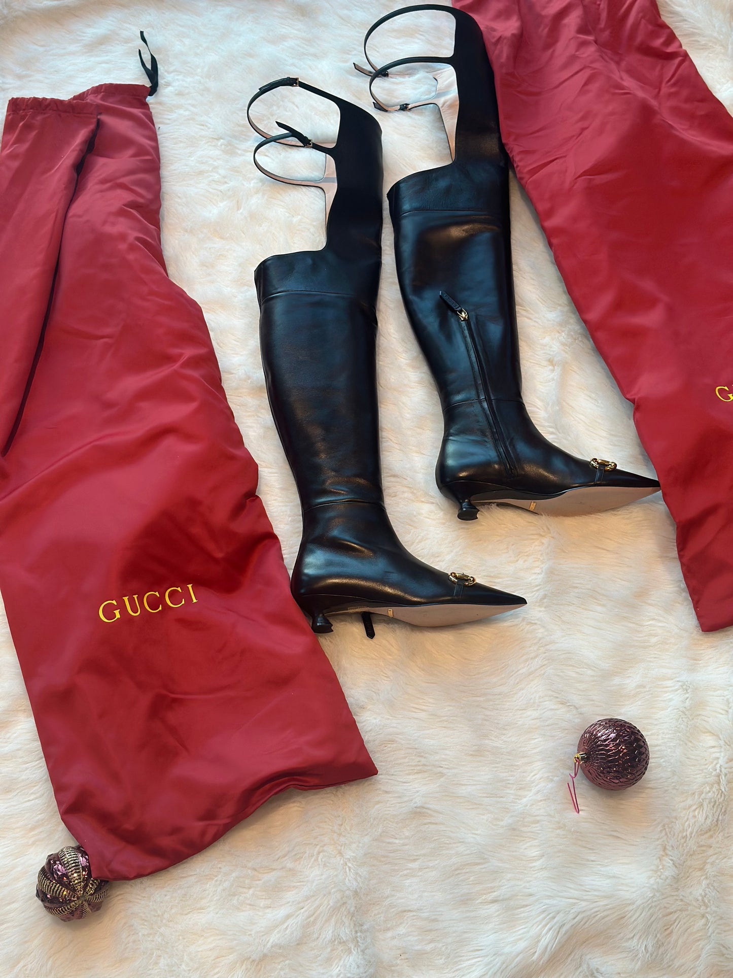 Gucci Black Leather Over the Knee Horsebit Boots Profile View with Garment Bags