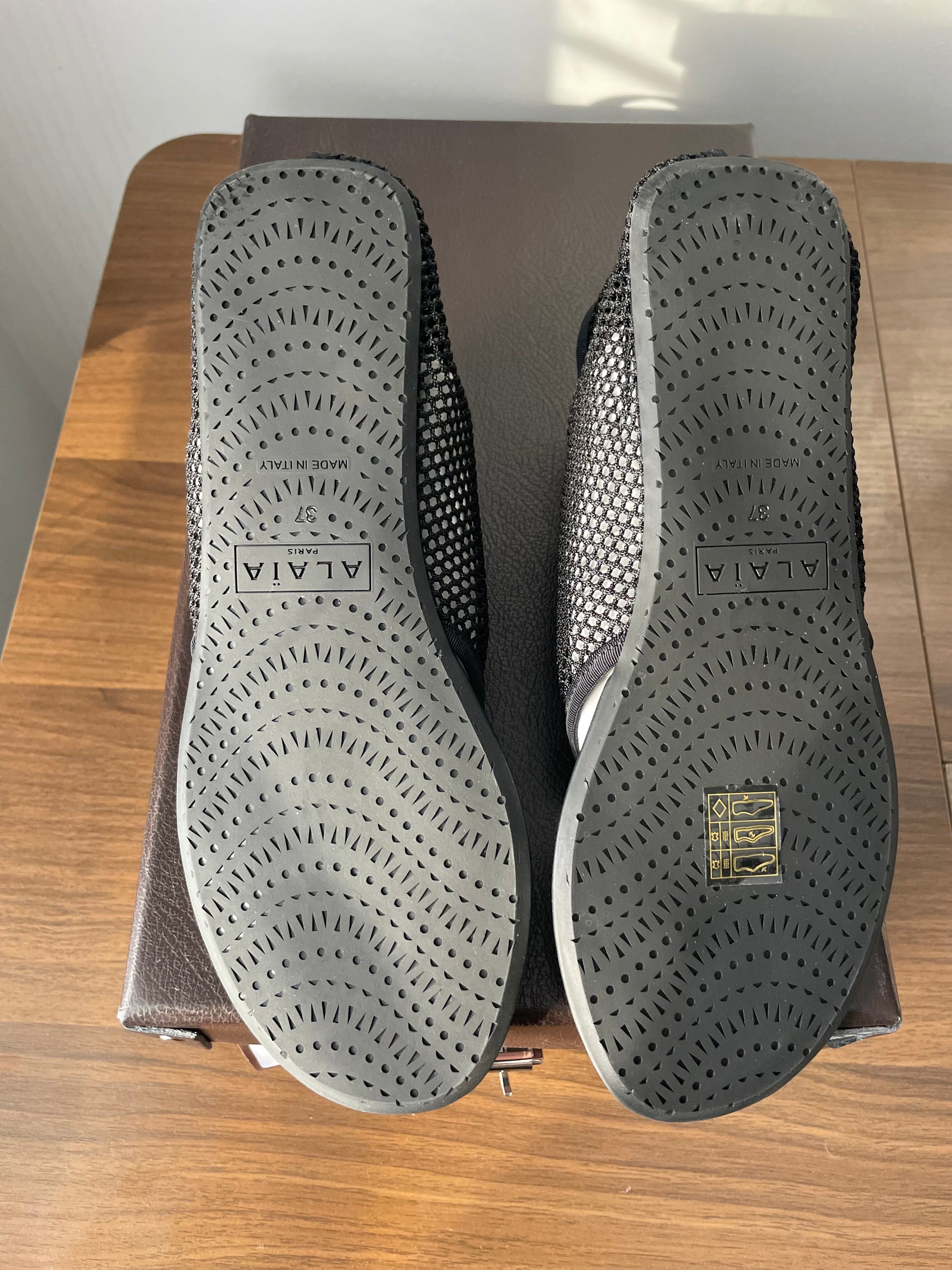 Alaia black mesh thong flat sandals rubber soles