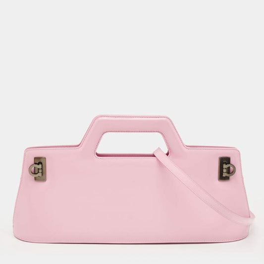 Pink leather Ferragamo Wanda handbag with gunmetal hardware on a white background
