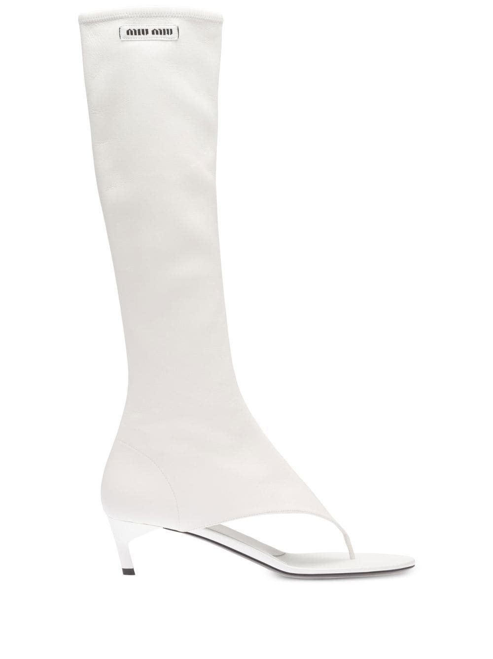 Side view of white leather knee-high Miu Miu open-toe boots on a white background