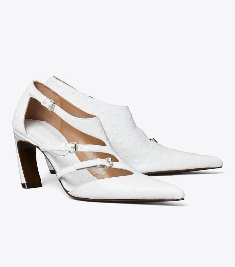 Pair of White Tory Burch White Multi-Buckle Pump Product Shot against white background